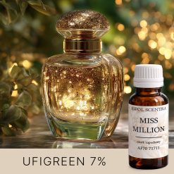 Złoty flakon perfum z brokatem w ciepłym świetle.