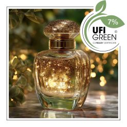 Złoty flakon perfum z brokatem w ciepłym świetle.